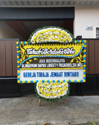 Papan Bunga Duka di Tampan